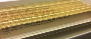 Close up image of file folders with titles related to the Metro Toronto Housing Authority